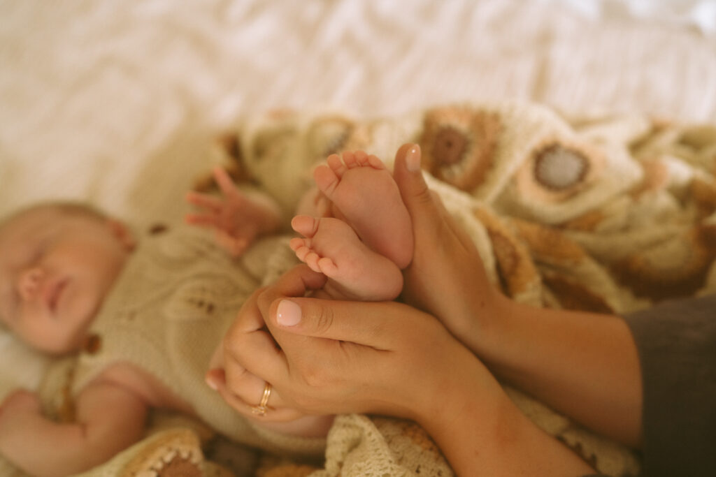 Close up of newborn baby feet