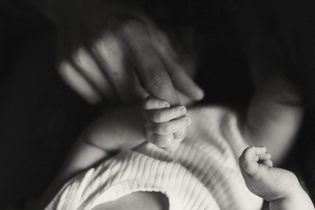 Close up of a newborn baby hand