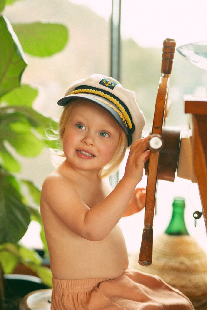 Emma and her son Cash on a vintage-style houseboat.