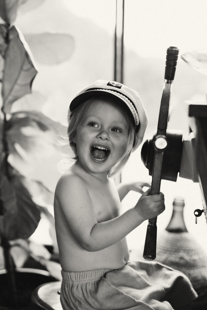 Emma and her son Cash on a vintage-style houseboat.