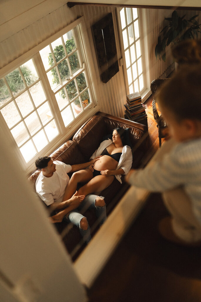 A family having staycation maternity photos taken