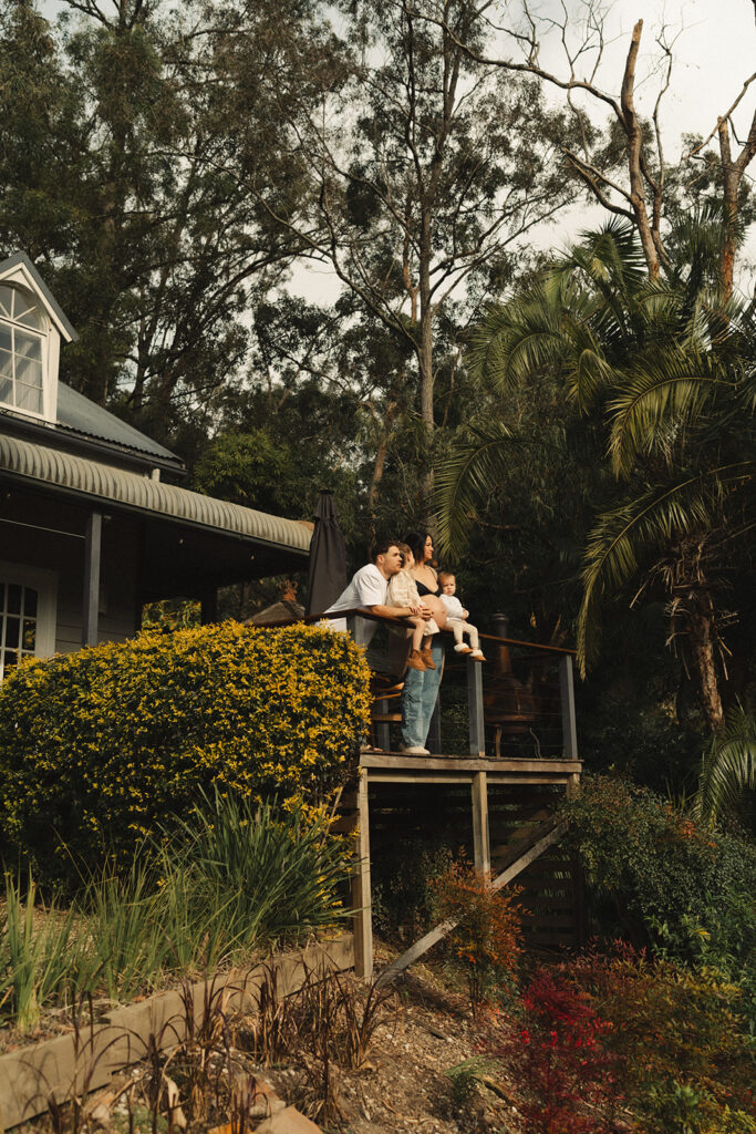 A family having staycation maternity photos taken