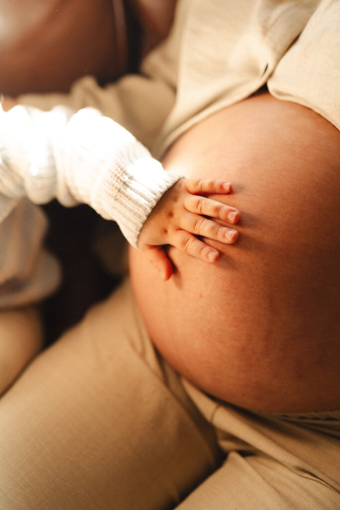 A family having staycation maternity photos taken