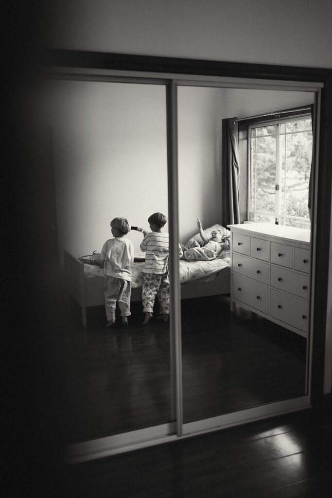 Kids playing during an in-home motherhood shoot