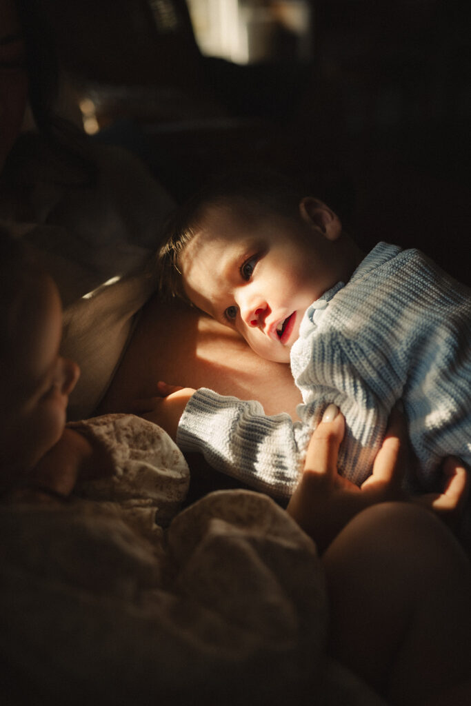 A family having staycation maternity photos taken