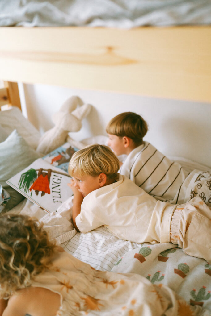 Kids playing during an in-home motherhood shoot