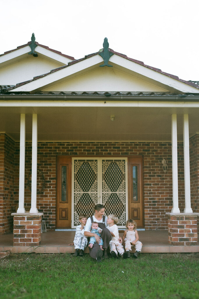 Kids playing during an in-home motherhood shoot