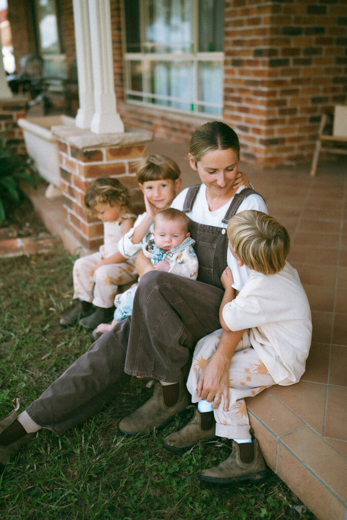 Kids playing during an in-home motherhood shoot
