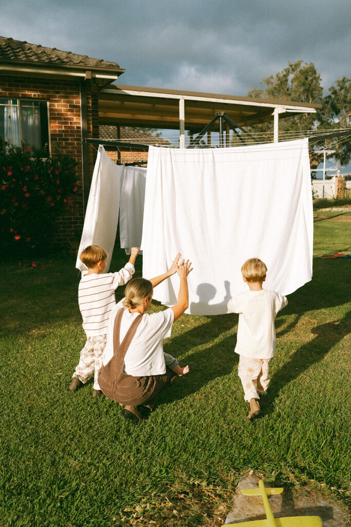 Kids playing during an in-home motherhood shoot