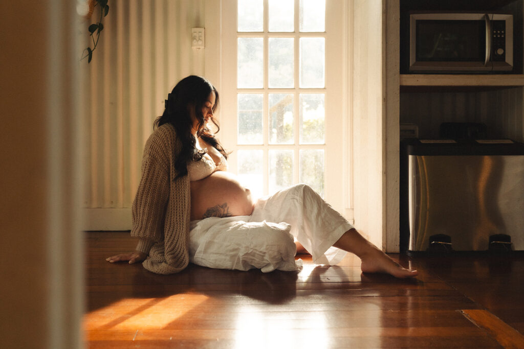 A family having staycation maternity photos taken