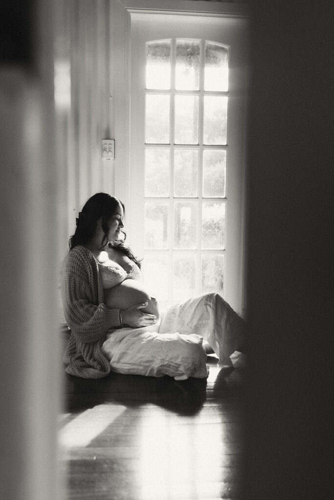 A family having staycation maternity photos taken