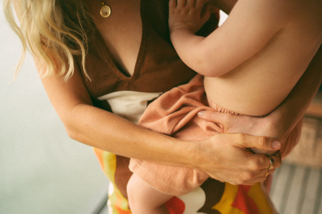 Emma and her son Cash on a vintage-style houseboat.