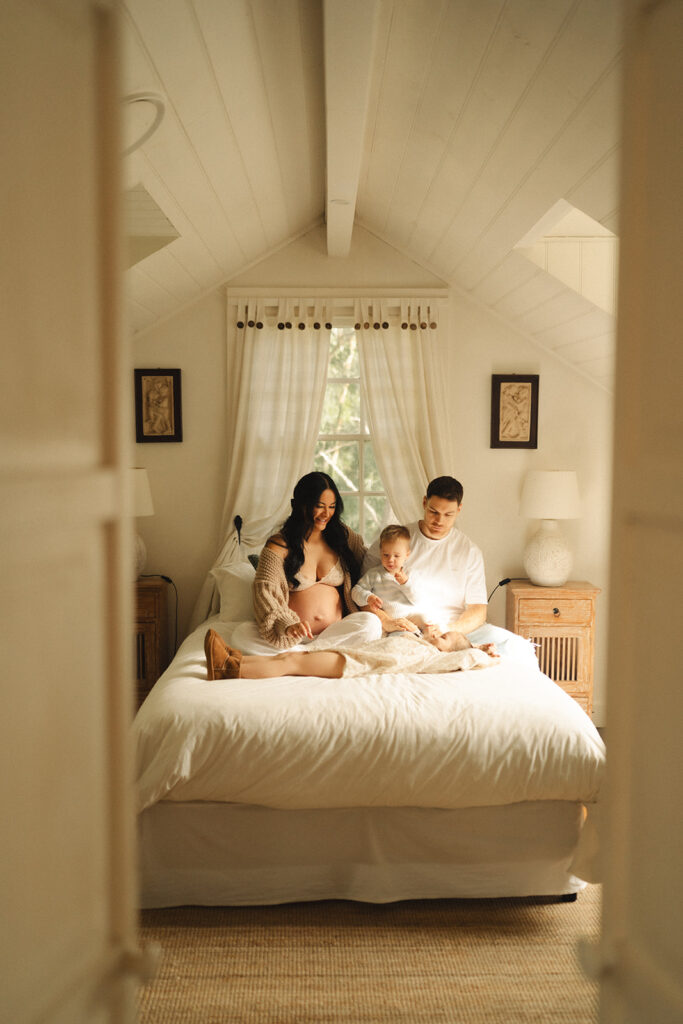 A family having staycation maternity photos taken