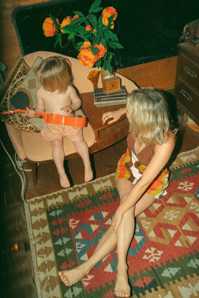 Emma and her son Cash on a vintage-style houseboat.