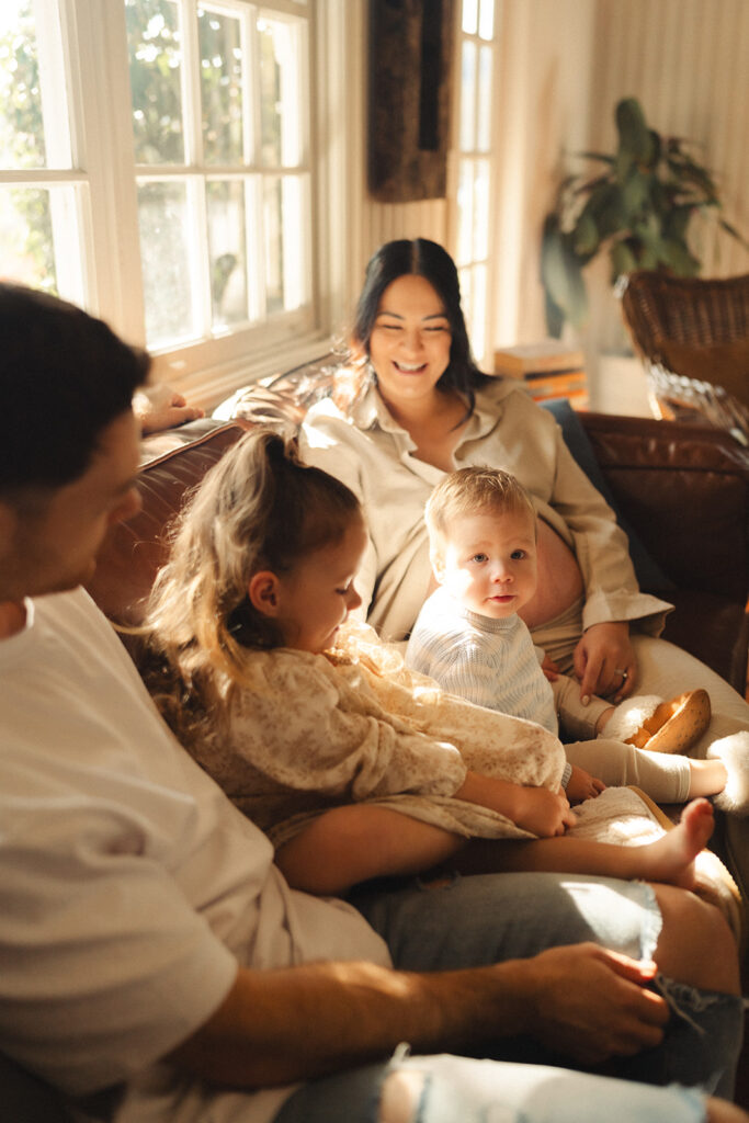 A family having staycation maternity photos taken