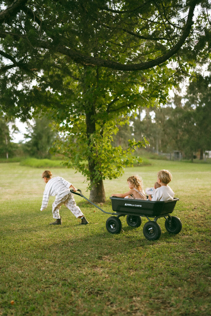 Kids playing during an in-home motherhood shoot