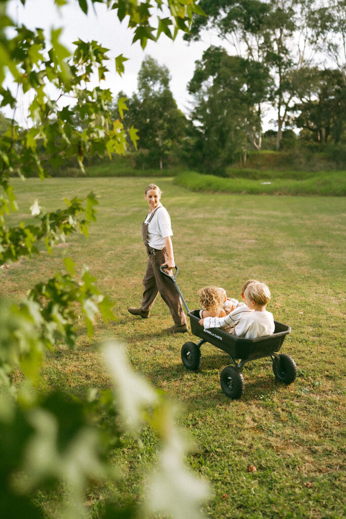 Kids playing during an in-home motherhood shoot