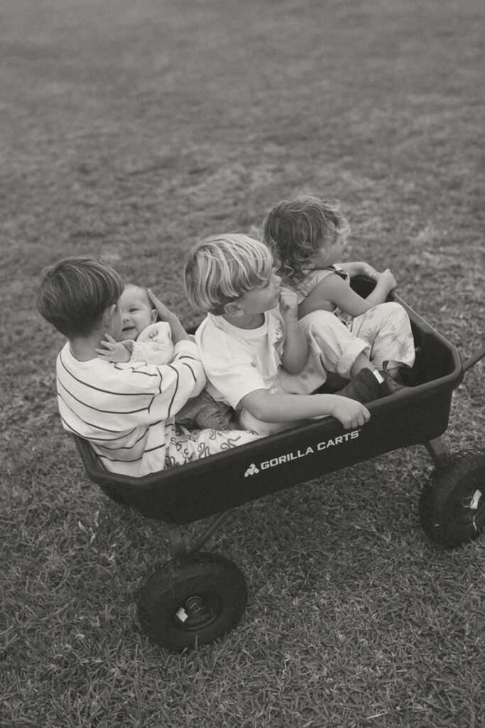 Kids playing during an in-home motherhood shoot