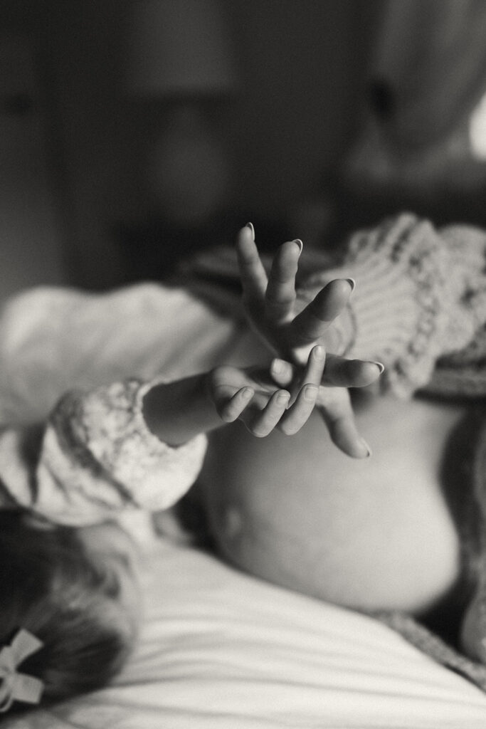 A family having staycation maternity photos taken